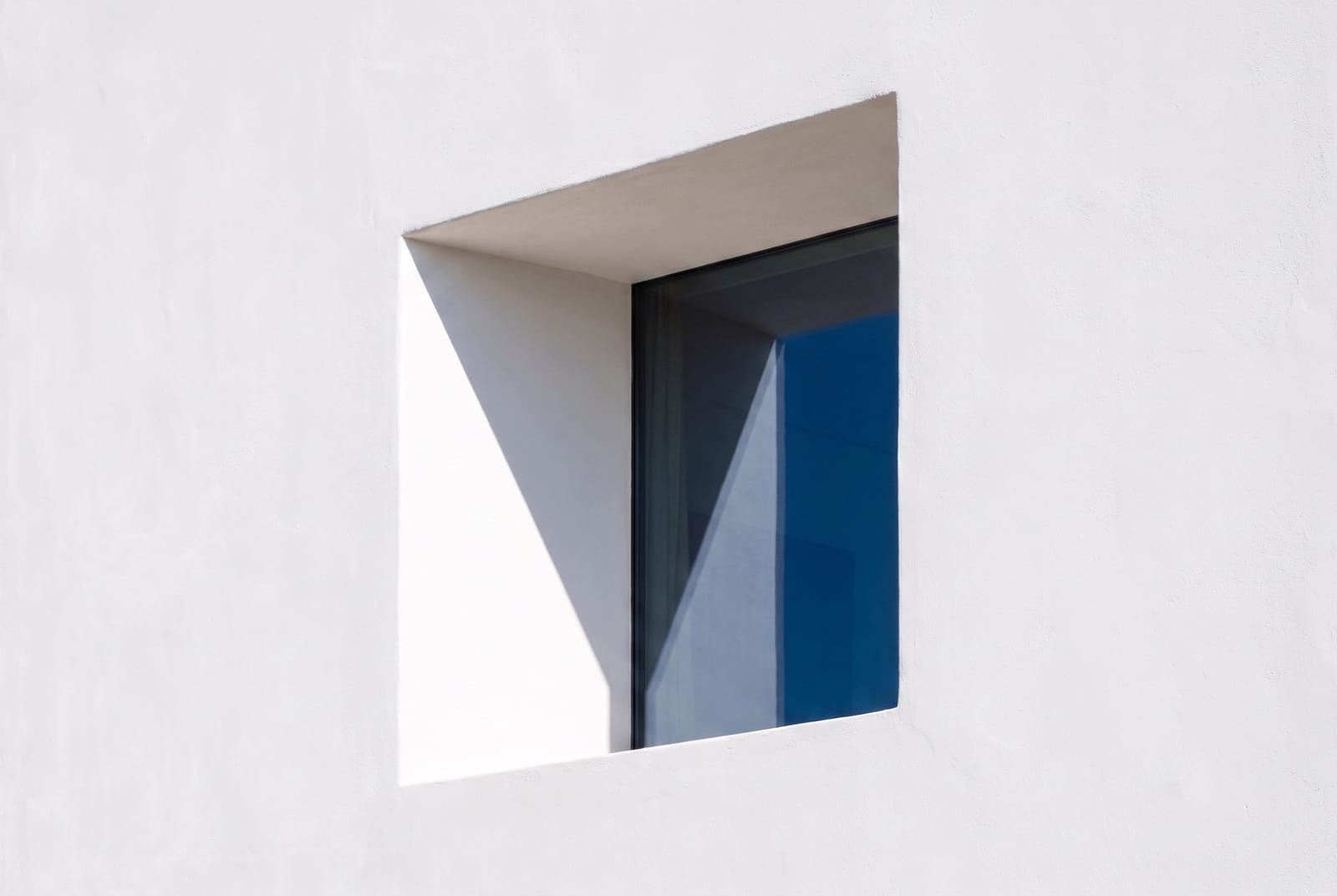 Deep window reveal, west elevation